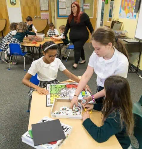 Manassas Christian School, Extended Care, picture of students playing bored games after school