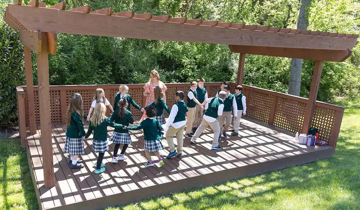 Manassas Christian School, Our Campus, picture of a class dancing in the schools amphitheater