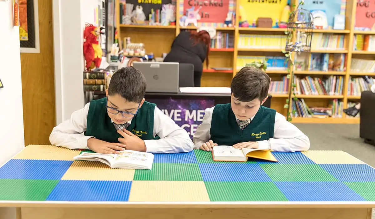 Manassas Christian School, Middle School Sixth-Eighth Grades, Two boys reading in the library